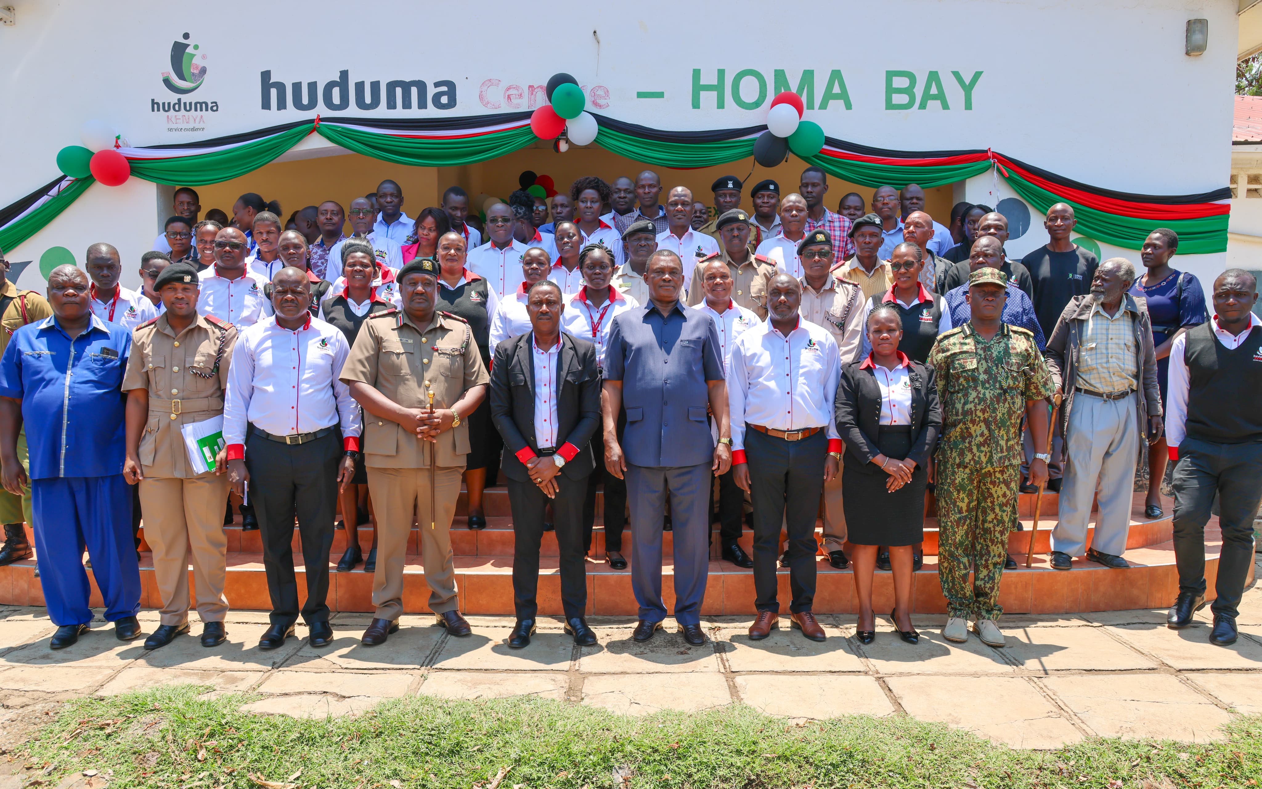 CS in a group photo with Huduma Centre Homa Bay County