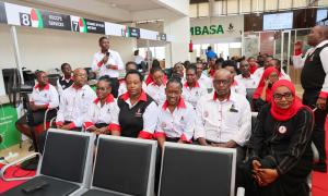 Huduma Staff listening to CS Public Service