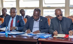 Union leaders signing the MoU