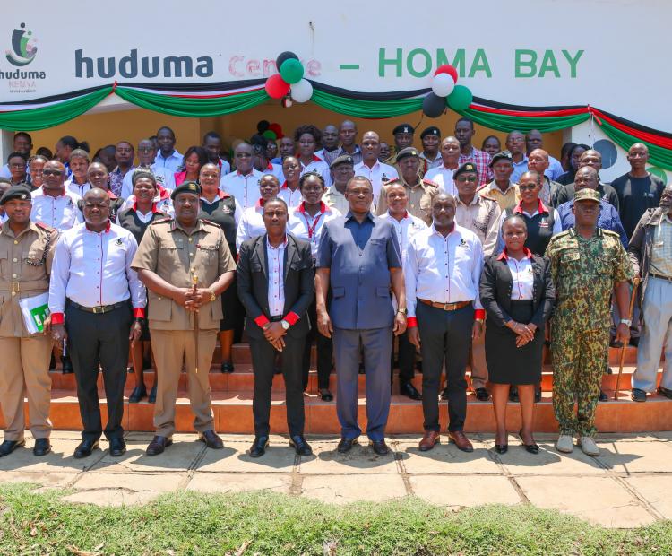 CS in a group photo with Huduma Centre Homa Bay County