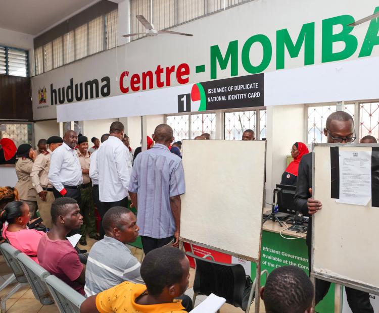 CS interacting with Huduma staff as he assess service Mombasa